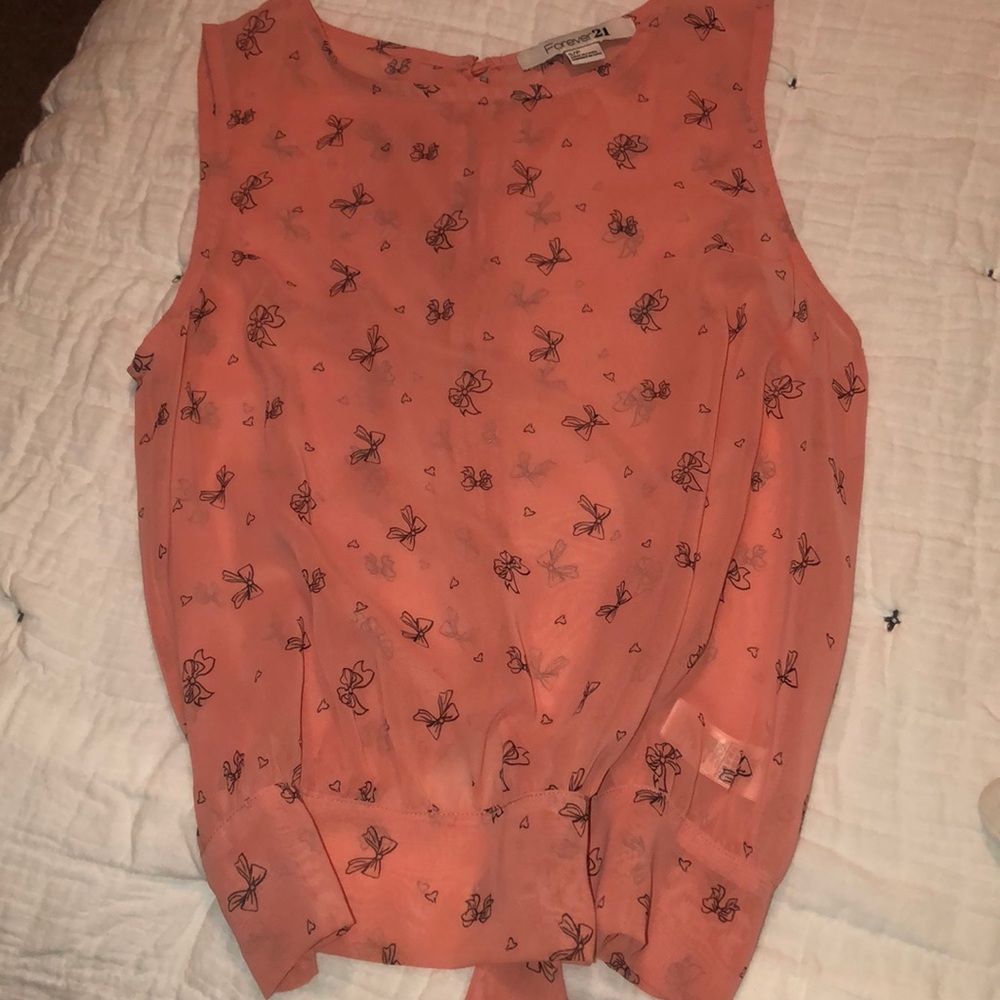 Salmon pink top with wrap tie in the back